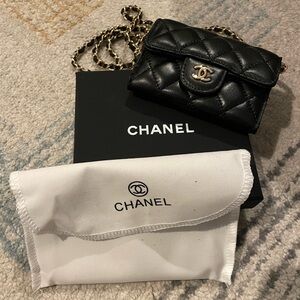Chanel Black Quilted Mini Bag with Gold Accents